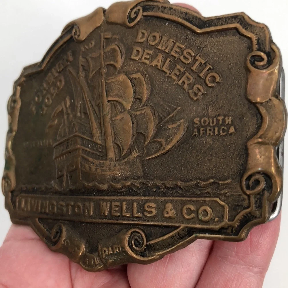 Livingston Wells & Co. Foreign Gold Domestic Dealers Brass Belt Buckle Nautical